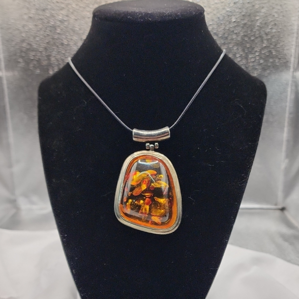 Elegant Silver and Amber Pendant Necklace